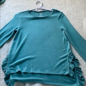 teal shirt